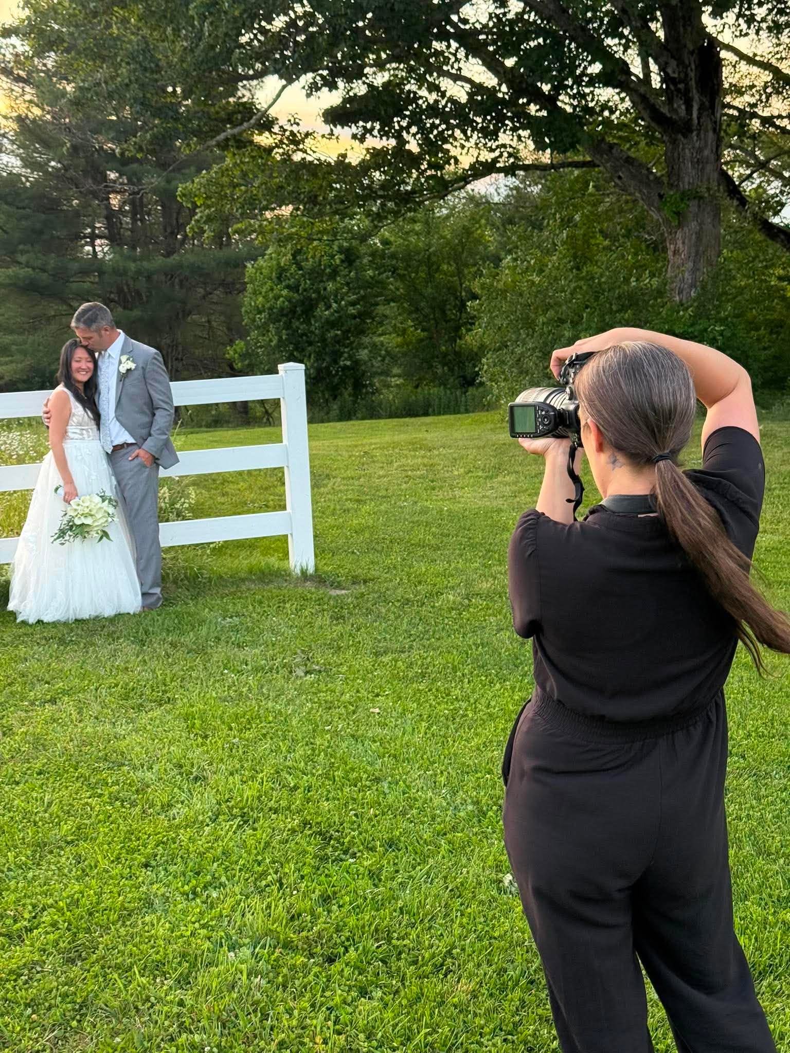 Emmie photographing a session in Maine